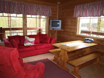 Фото номера Большой коттедж с 4 спальнями и сауной Дома для отпуска Loma-Rantala Cottages г. Тахковуори 5