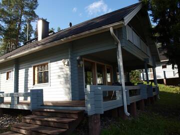 Фото номера Большой коттедж с 4 спальнями и сауной Дома для отпуска Loma-Rantala Cottages г. Тахковуори 7
