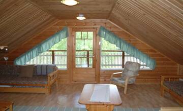 Фото номера Большой коттедж с 4 спальнями и сауной Дома для отпуска Loma-Rantala Cottages г. Тахковуори 10