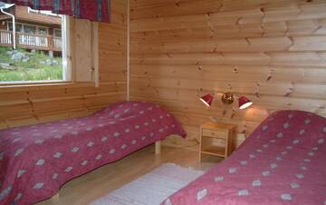 Фото номера Большой коттедж с 4 спальнями и сауной Дома для отпуска Loma-Rantala Cottages г. Тахковуори 3