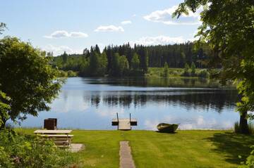 Фото номера Коттедж с 2 спальнями и сауной Дома для отпуска Rinnepelto Holiday Cottages г. Тахковуори 4