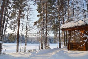 Фото номера Дом с 2 спальнями и видом на озеро Дома для отпуска Rinnepelto Holiday Cottages г. Тахковуори 5