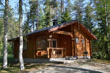 Фото номера Коттедж с 1 спальней и видом на озеро Дома для отпуска Rinnepelto Holiday Cottages г. Тахковуори 11