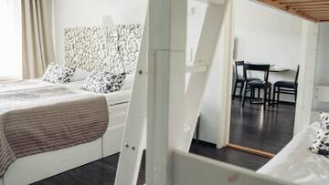 Фото номера Семейный номер с террасой Отель Ukko Hotel г. Тахковуори 5