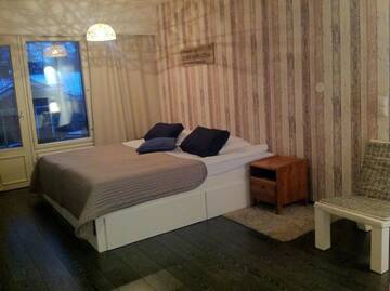 Фото номера Двухместный номер с 2 отдельными кроватями и окном Отель Ukko Hotel г. Тахковуори 5